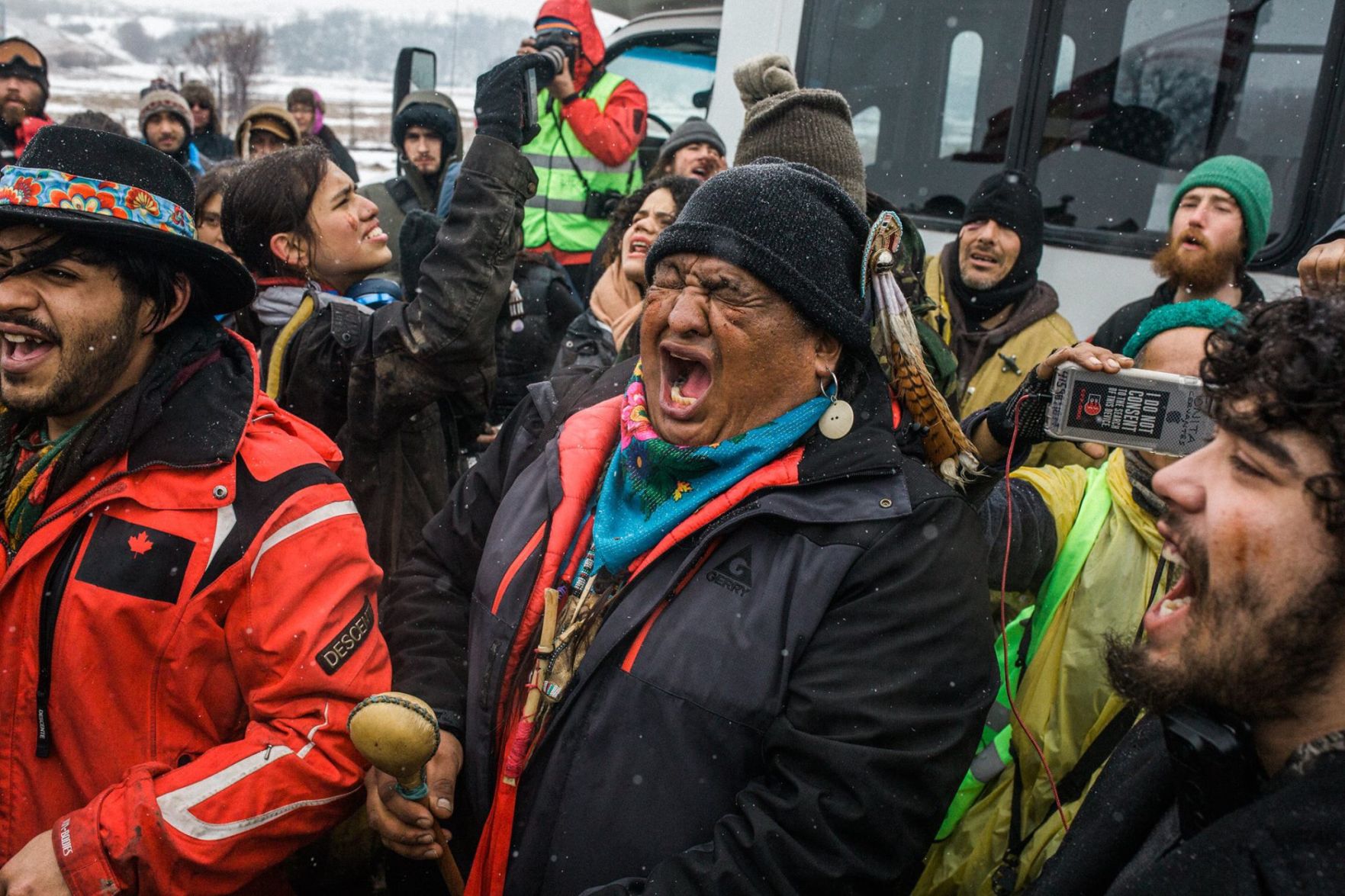 Dan Nanamkin sand during a peace parade as several hundred Water Protectors left Oceti Sakowin Camp near Cannonball, North Dakota, Feb. 22.